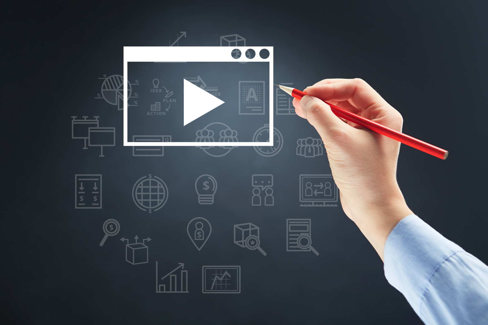 Hand holding a pencil with video marketing concept